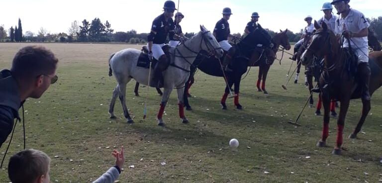 father and son doing polo throw in